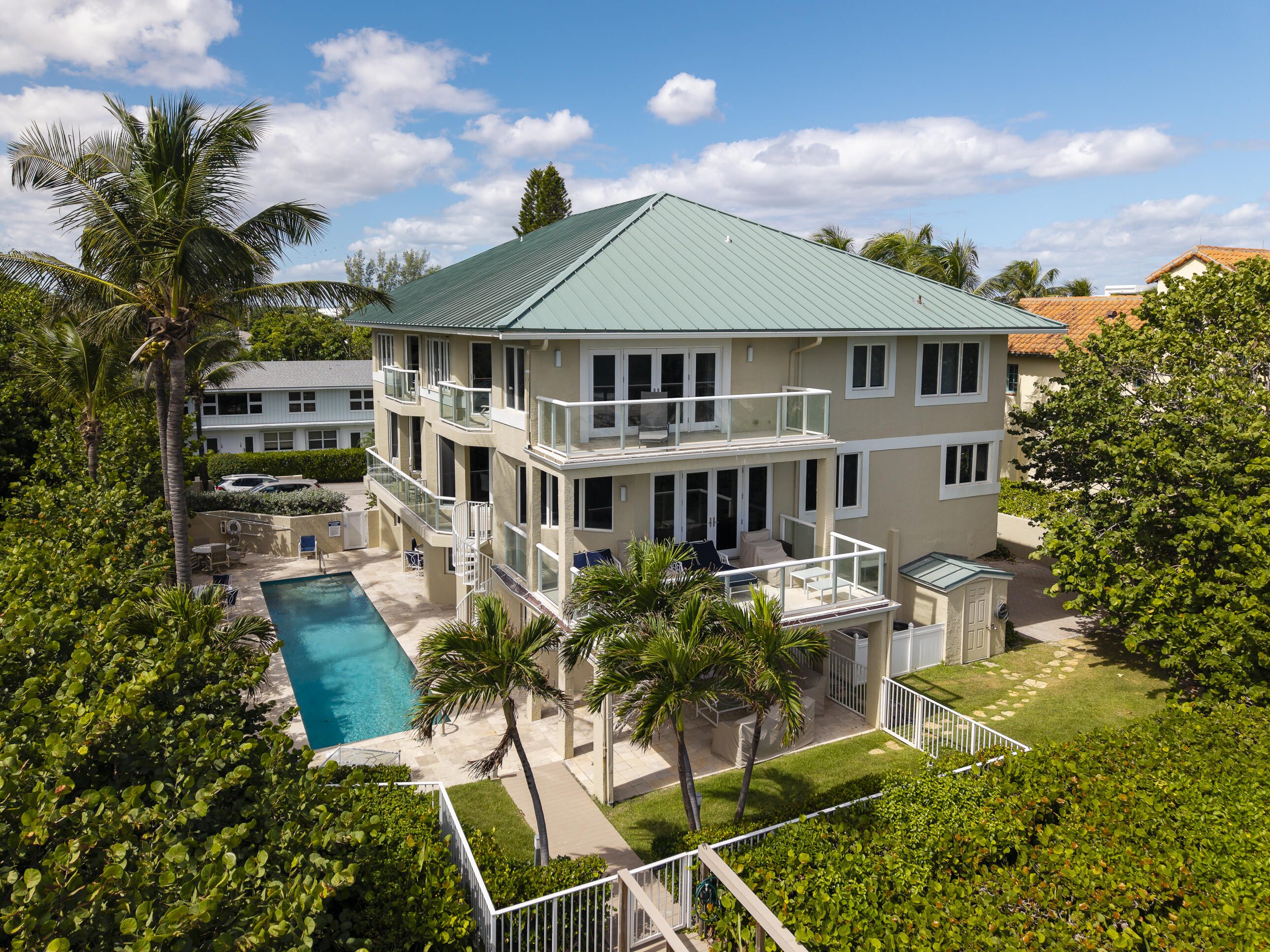 4535 Coquina Road Ocean Ridge, FL 33435 - Photo 42 of 45 a front view of a house with garden