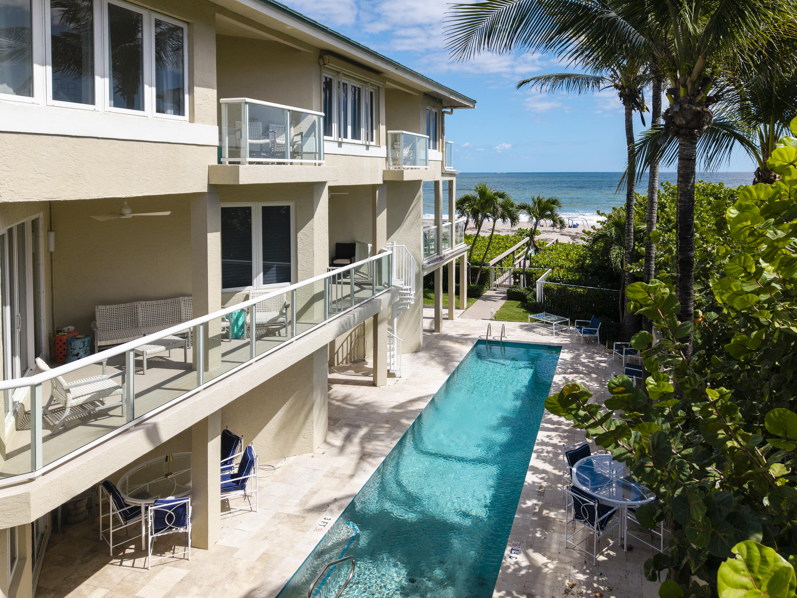 4535 Coquina Road Ocean Ridge, FL 33435 - Photo 44 of 45 a view of a house with a yard
