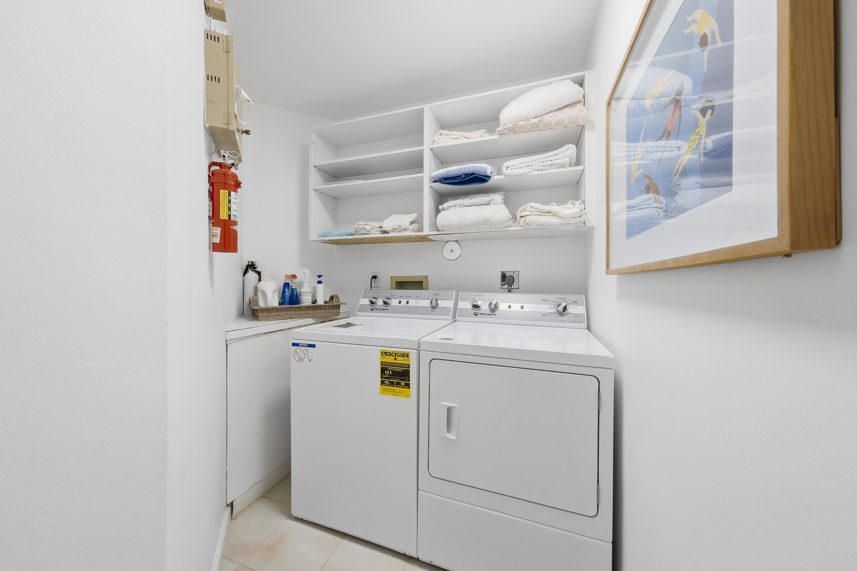 4535 Coquina Road Ocean Ridge, FL 33435 - Photo 8 of 45 a utility room with dryer and washer