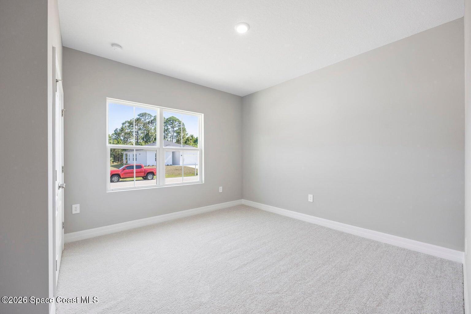 495 Harrison Street Southwest Palm Bay, FL 32908 - Photo 4 of 28 20250331150051044823000000-o
