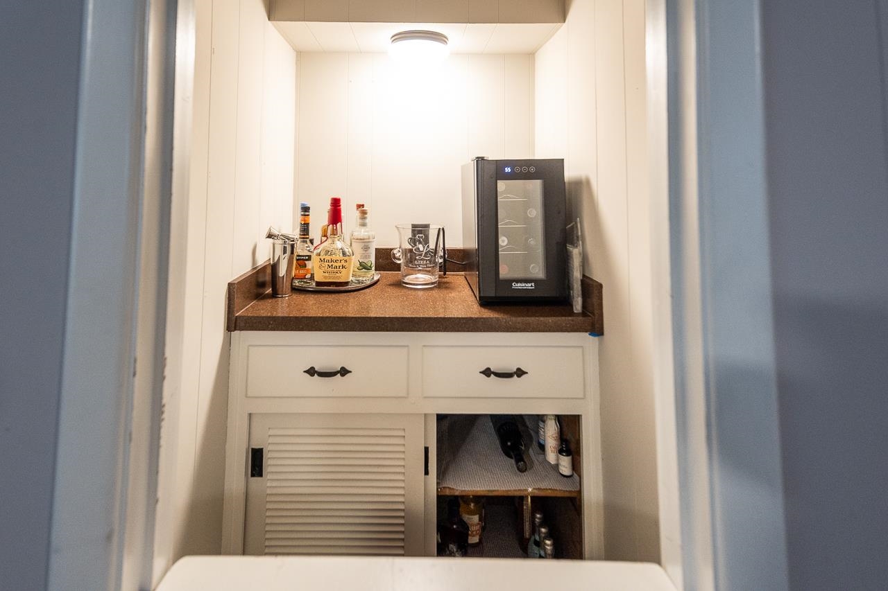 5681 Normandy Road Memphis, TN 38120 - Photo 17 of 22 a bathroom with a sink and a mirror
