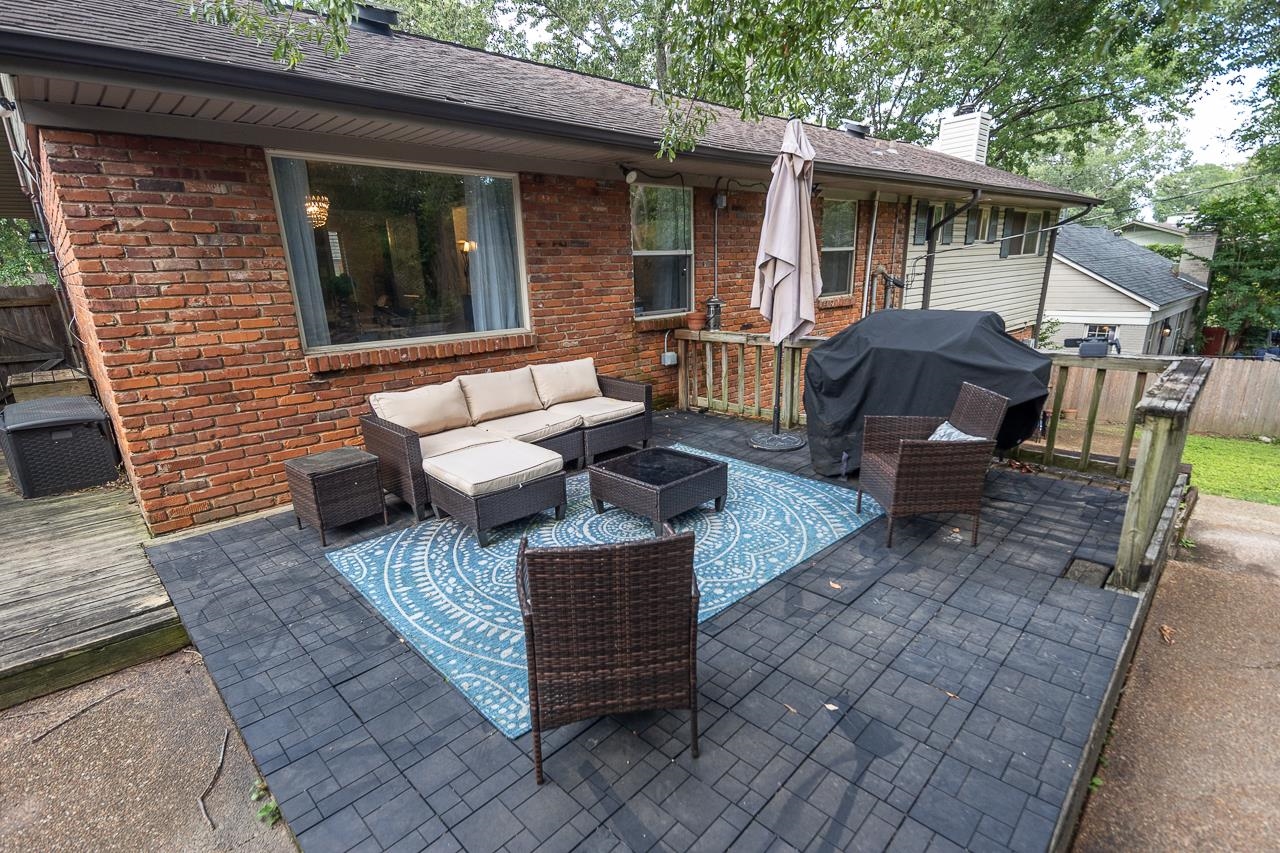 5681 Normandy Road Memphis, TN 38120 - Photo 19 of 22 a view of a couches on the deck in the backyard
