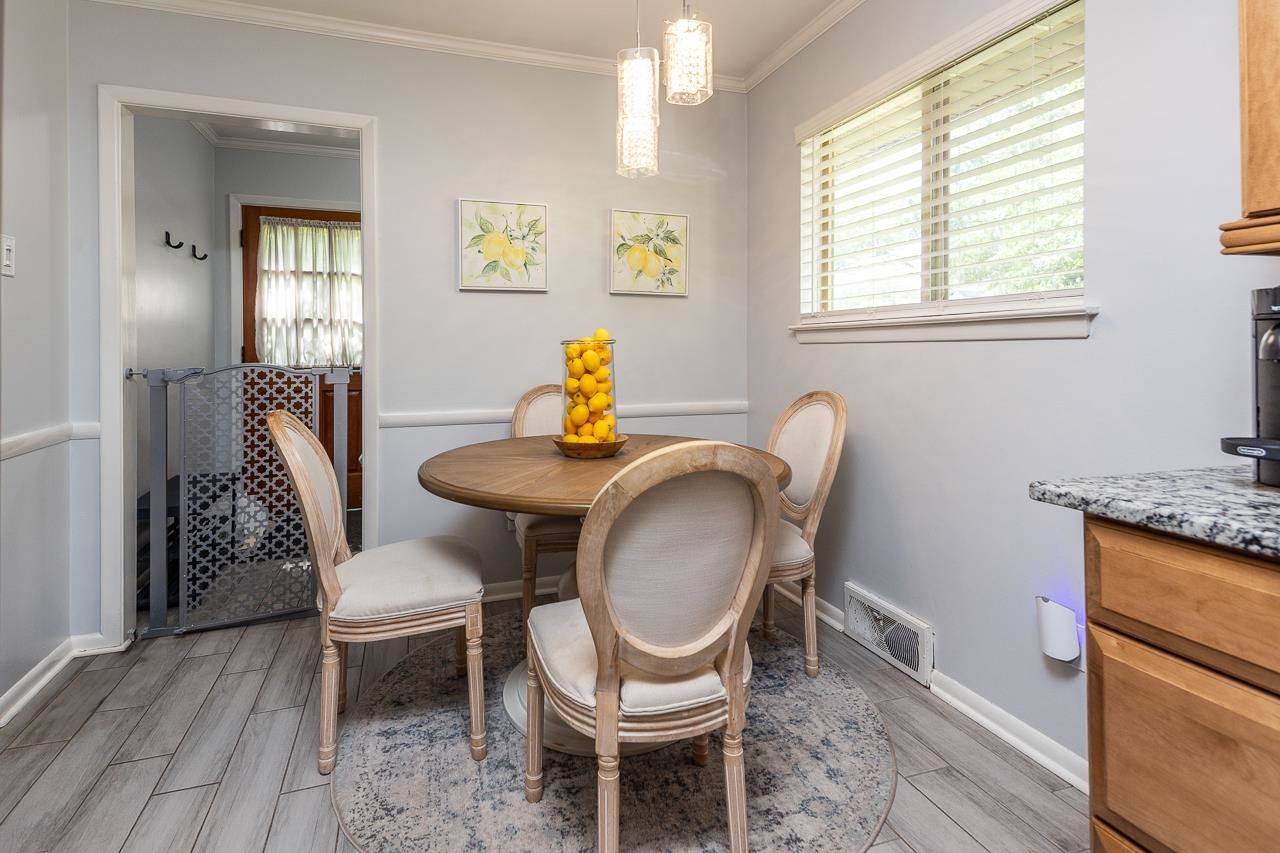 5681 Normandy Road Memphis, TN 38120 - Photo 5 of 22 a dining room with furniture and window