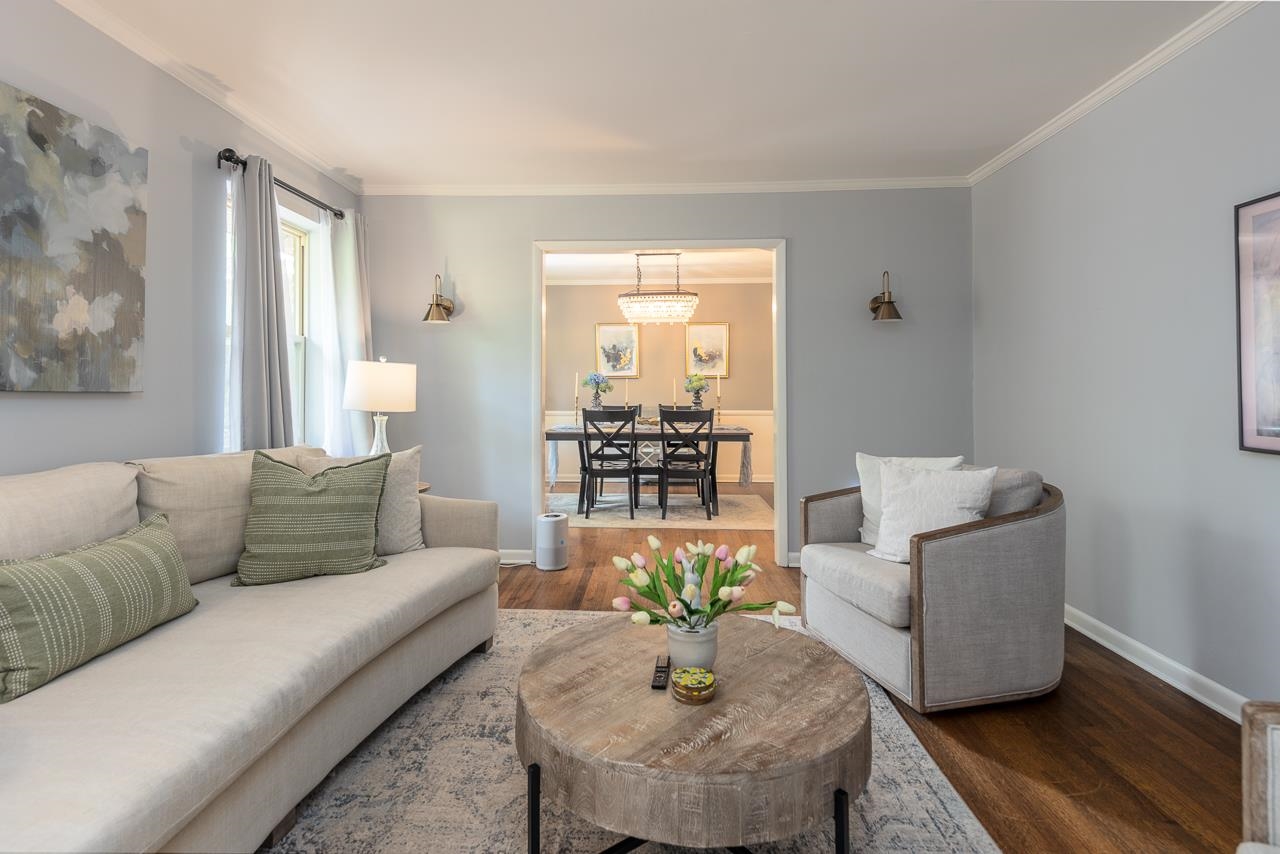 5681 Normandy Road Memphis, TN 38120 - Photo 7 of 22 a living room with furniture and a potted plant