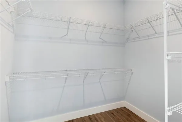 a view of a room with racks on the wall