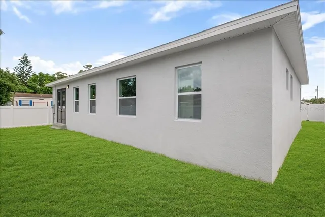 a view of backyard of house