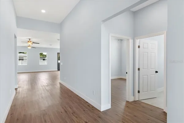 a view of livingroom with hardwood floor and hallway