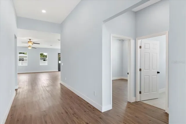 a view of livingroom with hardwood floor and hallway