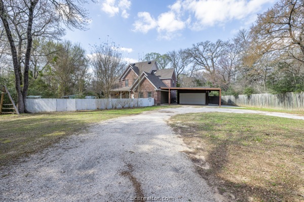 12 Raven's Nest Bryan, TX 77808 - Photo 2 of 46 a view of a house with a yard