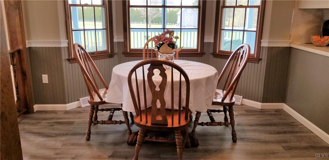 159 Meyer Road Nazareth, PA 18064 - Photo 3 of 19 a view of a dining room with furniture a chandelier and wooden floor