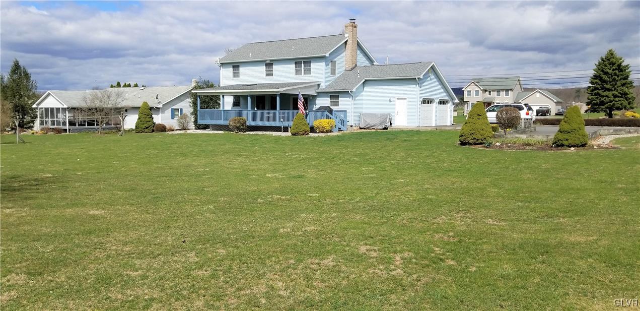 159 Meyer Road Nazareth, PA 18064 - Photo 5 of 19 a front view of a house with garden