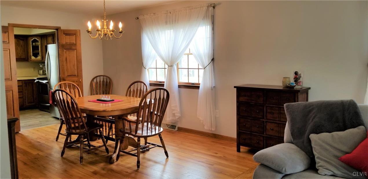 159 Meyer Road Nazareth, PA 18064 - Photo 7 of 19 a view of a dining room with furniture and wooden floor