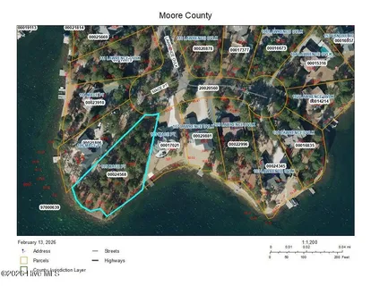 $990,000 | 105 Mace Point, Seven Lakes, NC 27376