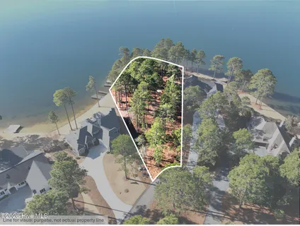 $990,000 | 105 Mace Point, Seven Lakes, NC 27376