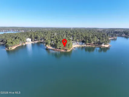 $990,000 | 105 Mace Point, Seven Lakes, NC 27376