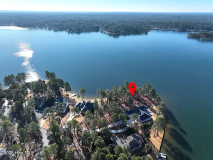 $990,000 | 105 Mace Point, Seven Lakes, NC 27376