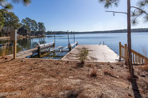 $990,000 | 105 Mace Point, Seven Lakes, NC 27376