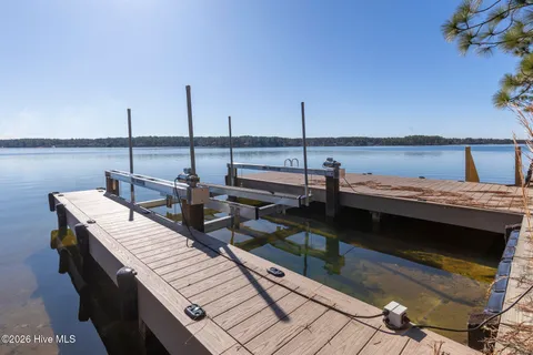 $990,000 | 105 Mace Point, Seven Lakes, NC 27376