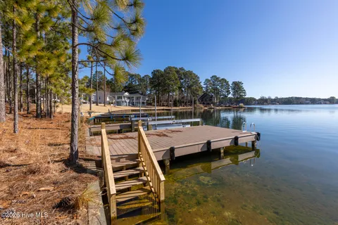 $990,000 | 105 Mace Point, Seven Lakes, NC 27376