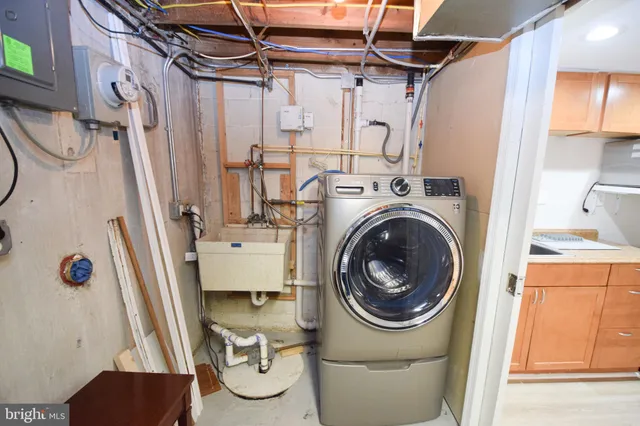 a utility room with dryer and washer