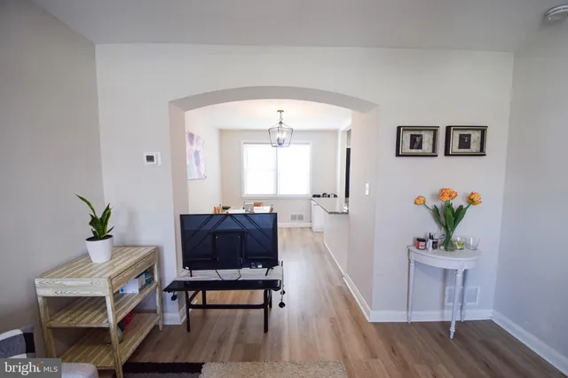 a dining room with a table and chairs