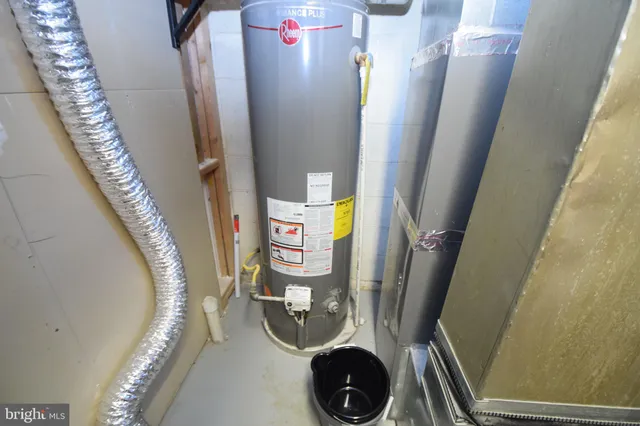 a view of a patio with a table and chairs