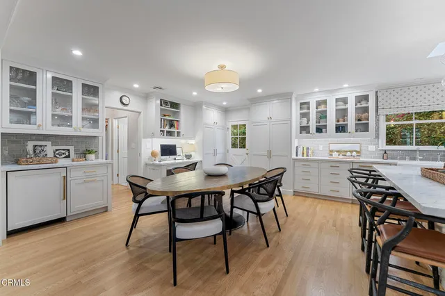 a bedroom with a bed and a chair