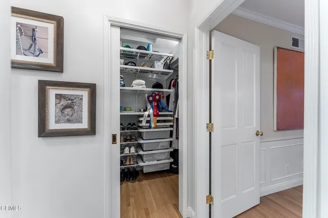 a bedroom with a bed and a table