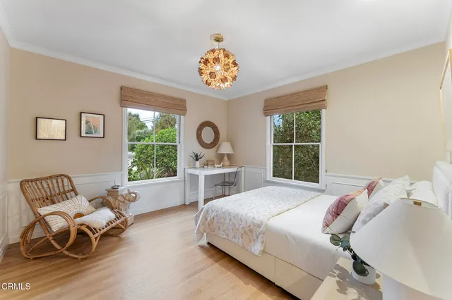 a bathroom with a granite countertop sink mirror and toilet