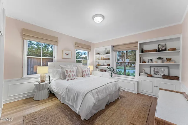 a bathroom with a sink double vanity and a mirror