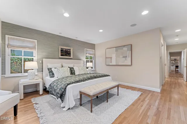 a living room with furniture and windows