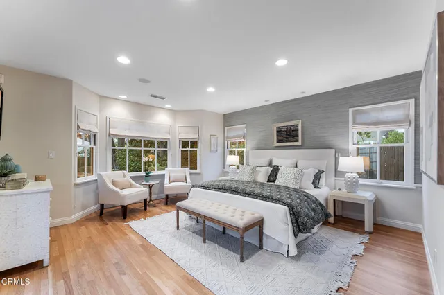 a bathroom with a double vanity sink mirror and double