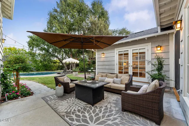a living room with a couch and a flat screen tv