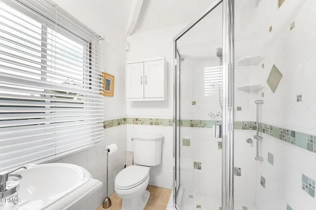 an aerial view of a house with a garden