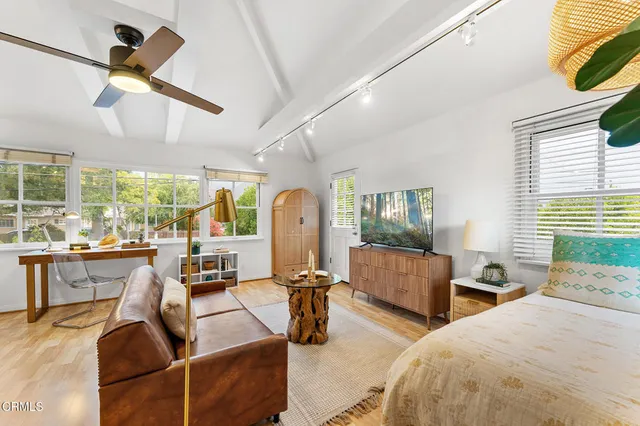 an aerial view of house with yard