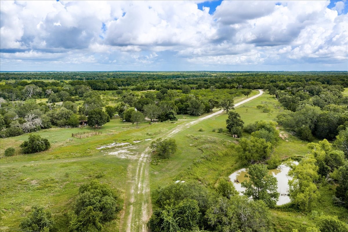 2845 Boehnke Road Muldoon, TX 78949 - Photo 16 of 39 a view of a yard with a house