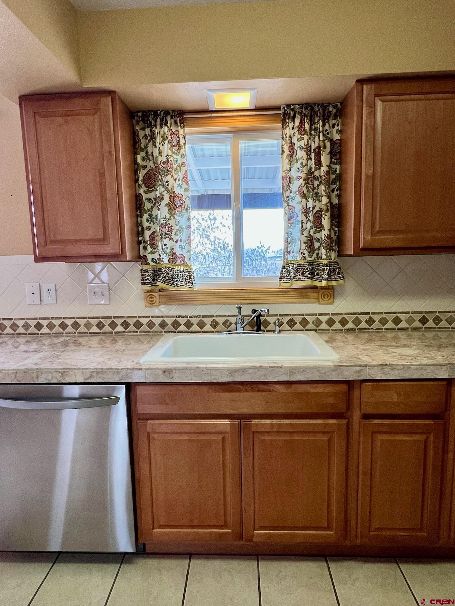 485 1740th Road Delta, CO 81416 - Photo 15 of 37 a view of a kitchen with granite countertop cabinets and a granite counter tops