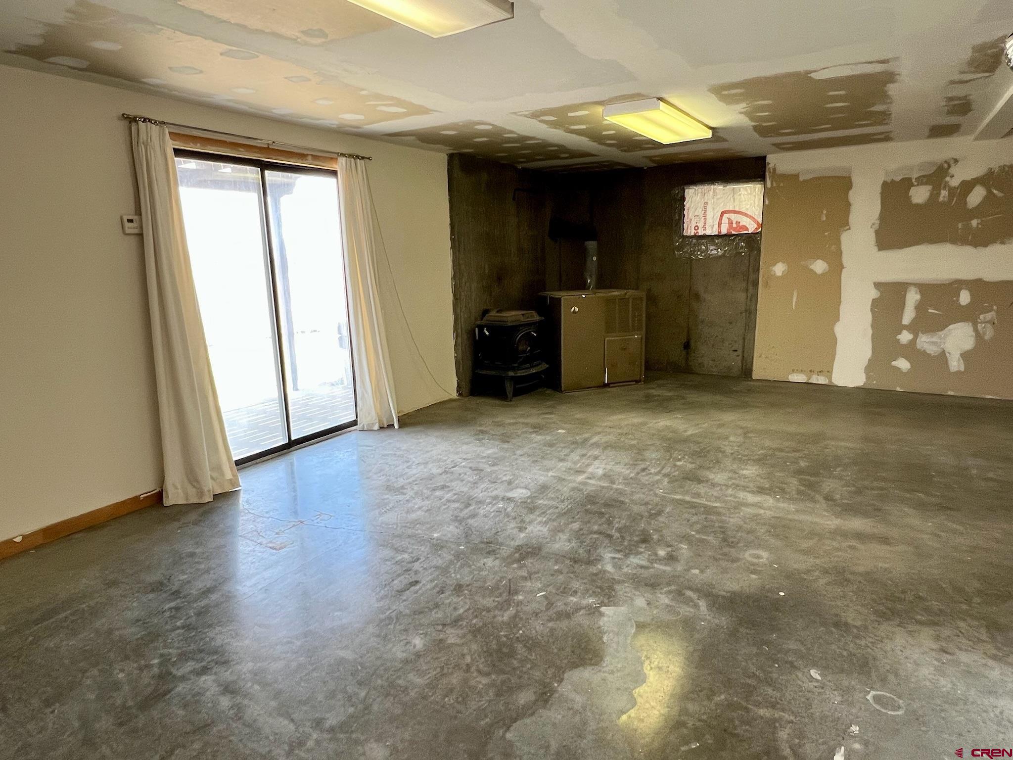 485 1740th Road Delta, CO 81416 - Photo 29 of 37 an empty room with closet and mirrors