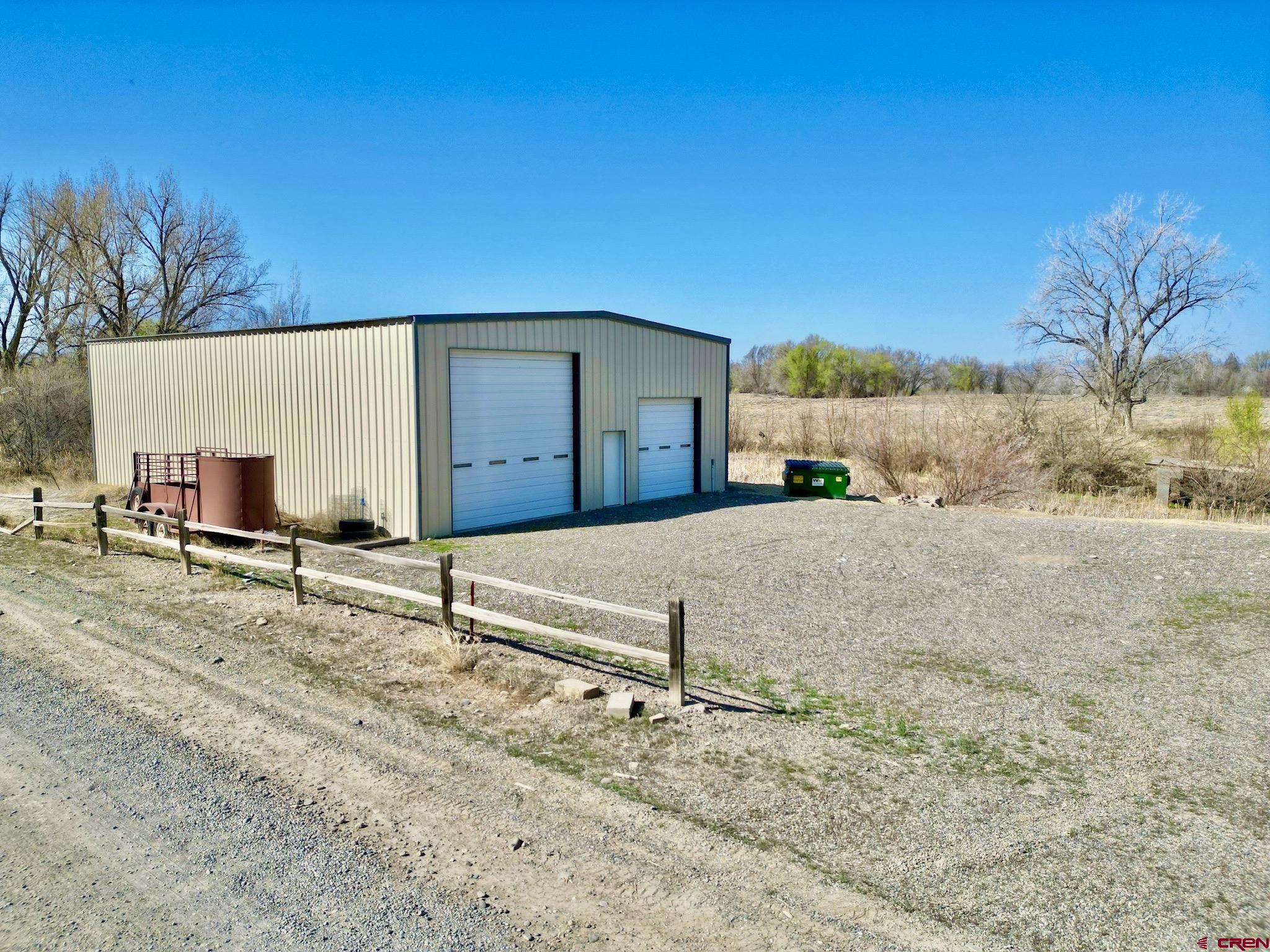 485 1740th Road Delta, CO 81416 - Photo 3 of 37 a view of a house with a snow in the yard