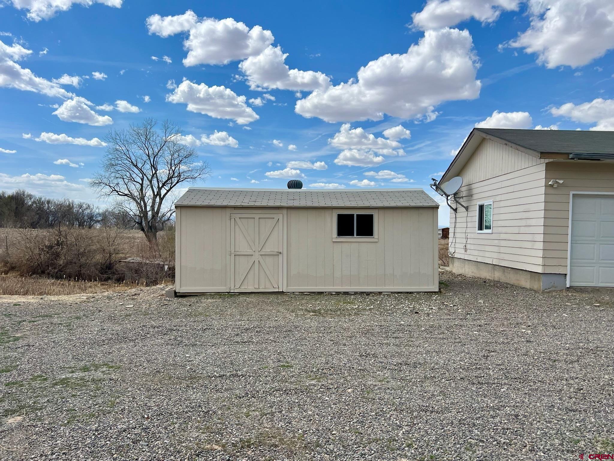 485 1740th Road Delta, CO 81416 - Photo 36 of 37 a view of a house with a dry yard