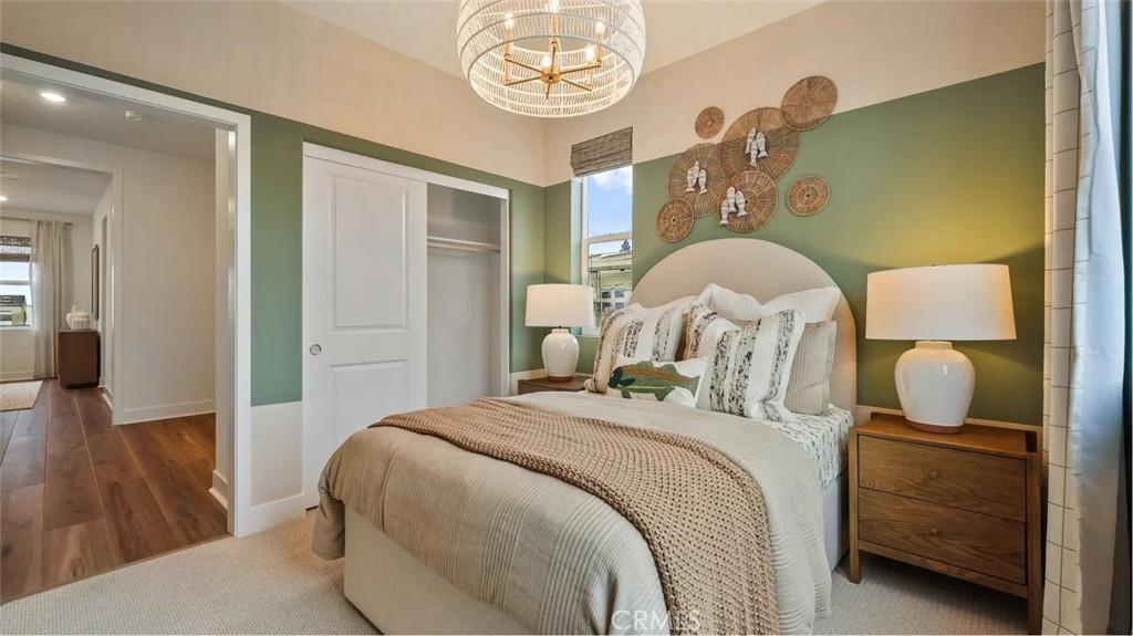 1829 Lychee Street Fullerton, CA 92833 - Photo 17 of 23 a bedroom with a bed and wooden floor