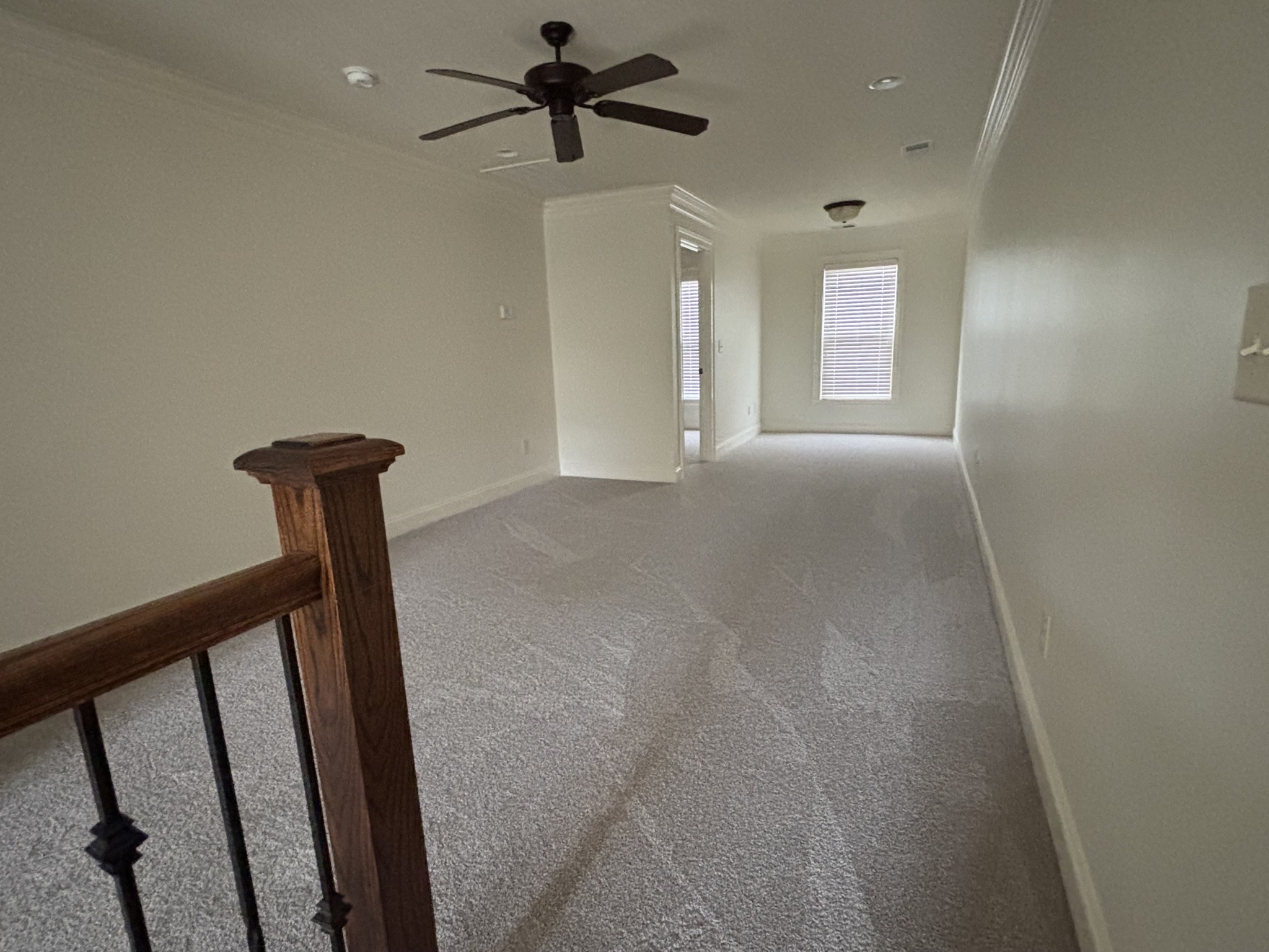 373 Byron Way Franklin, TN 37064 - Photo 11 of 15 a view of a hallway with a chandelier
