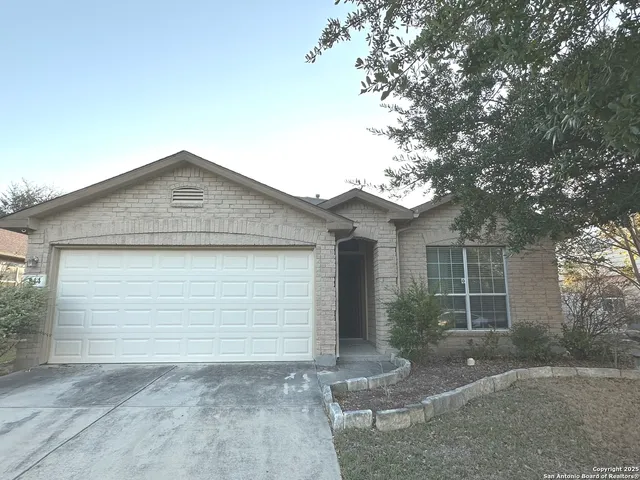 a small white house with a outdoor space