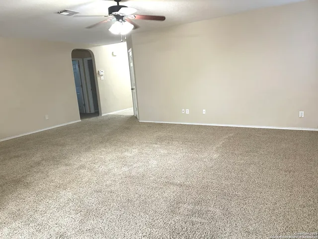 a kitchen with stainless steel appliances granite countertop a sink and a stove top oven