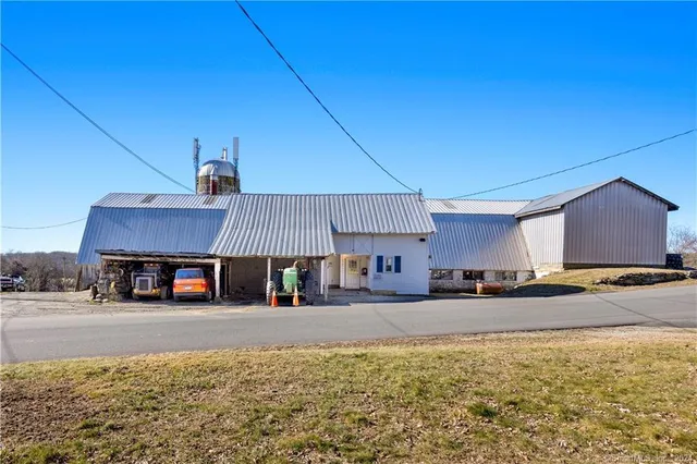 a view of a kitchen with a sink and cabinets