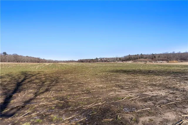 an aerial view of beach and city