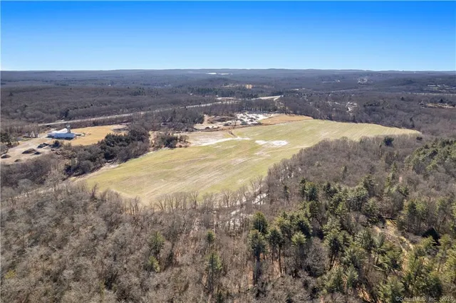 an aerial view of beach and city