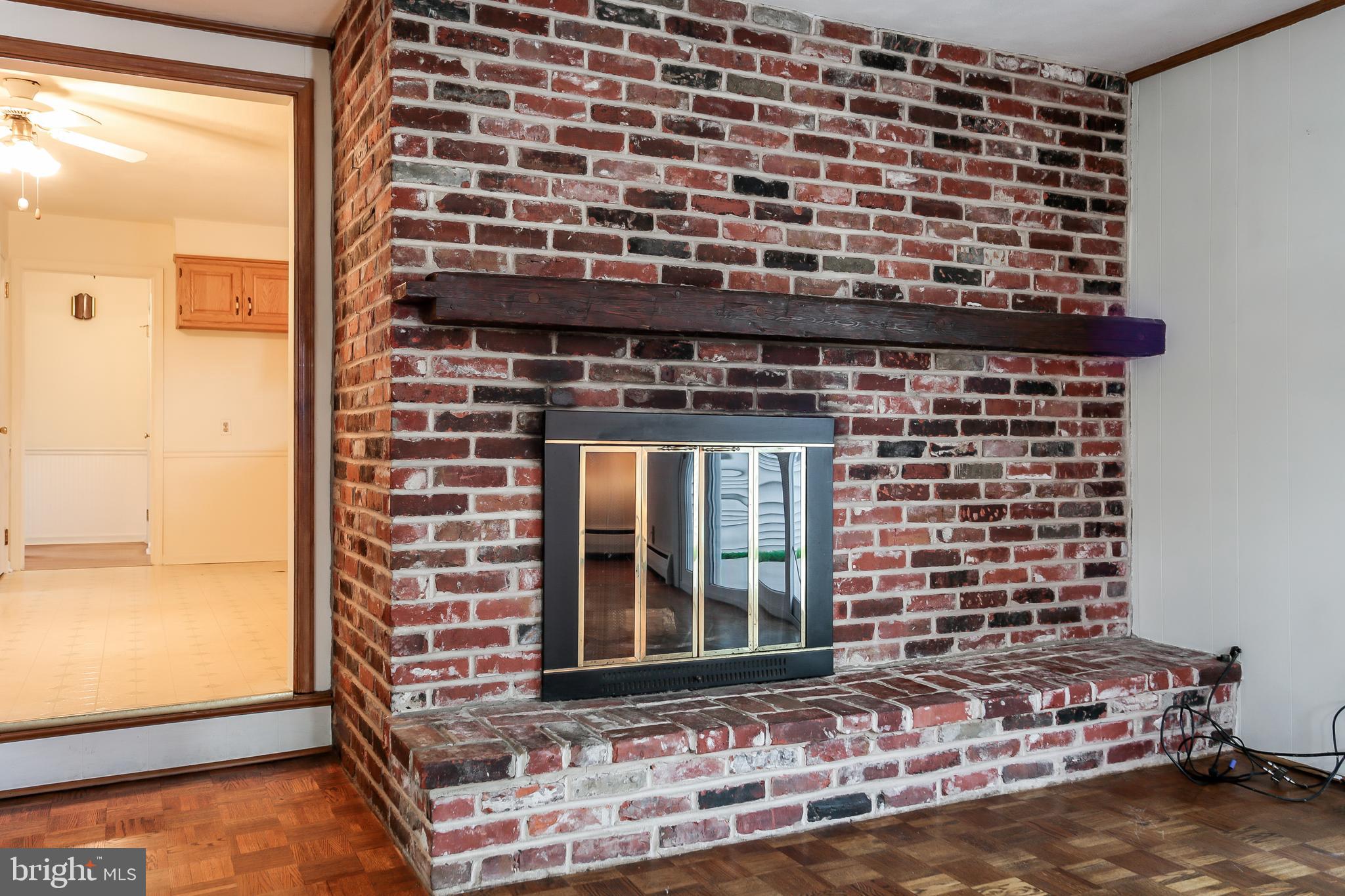 855 Contention Lane Berwyn, PA 19312 - Photo 14 of 33 Family Room With Brick Mantle and Fireplace