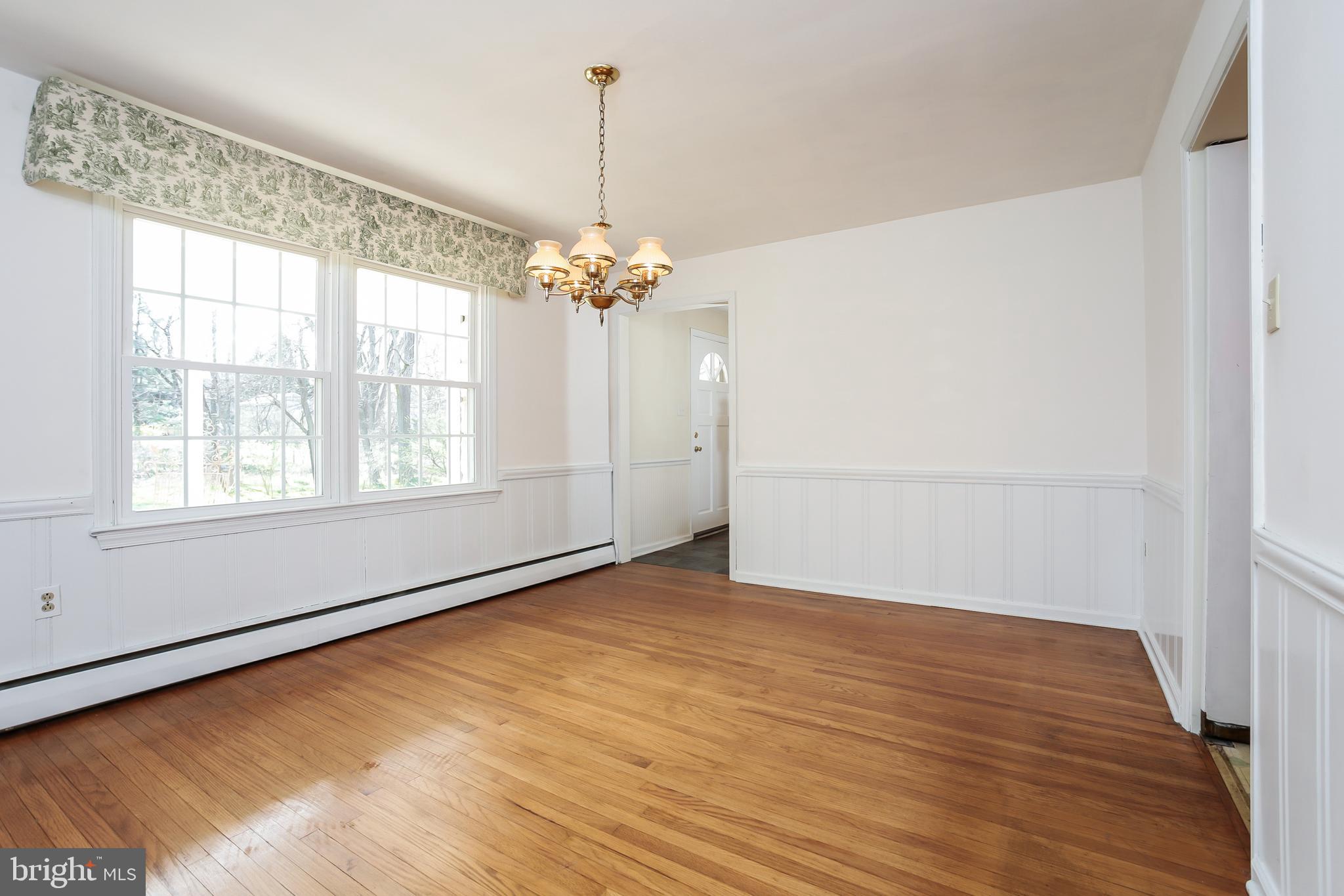 Formal Dining Room With Chair Rail and Wainscoting