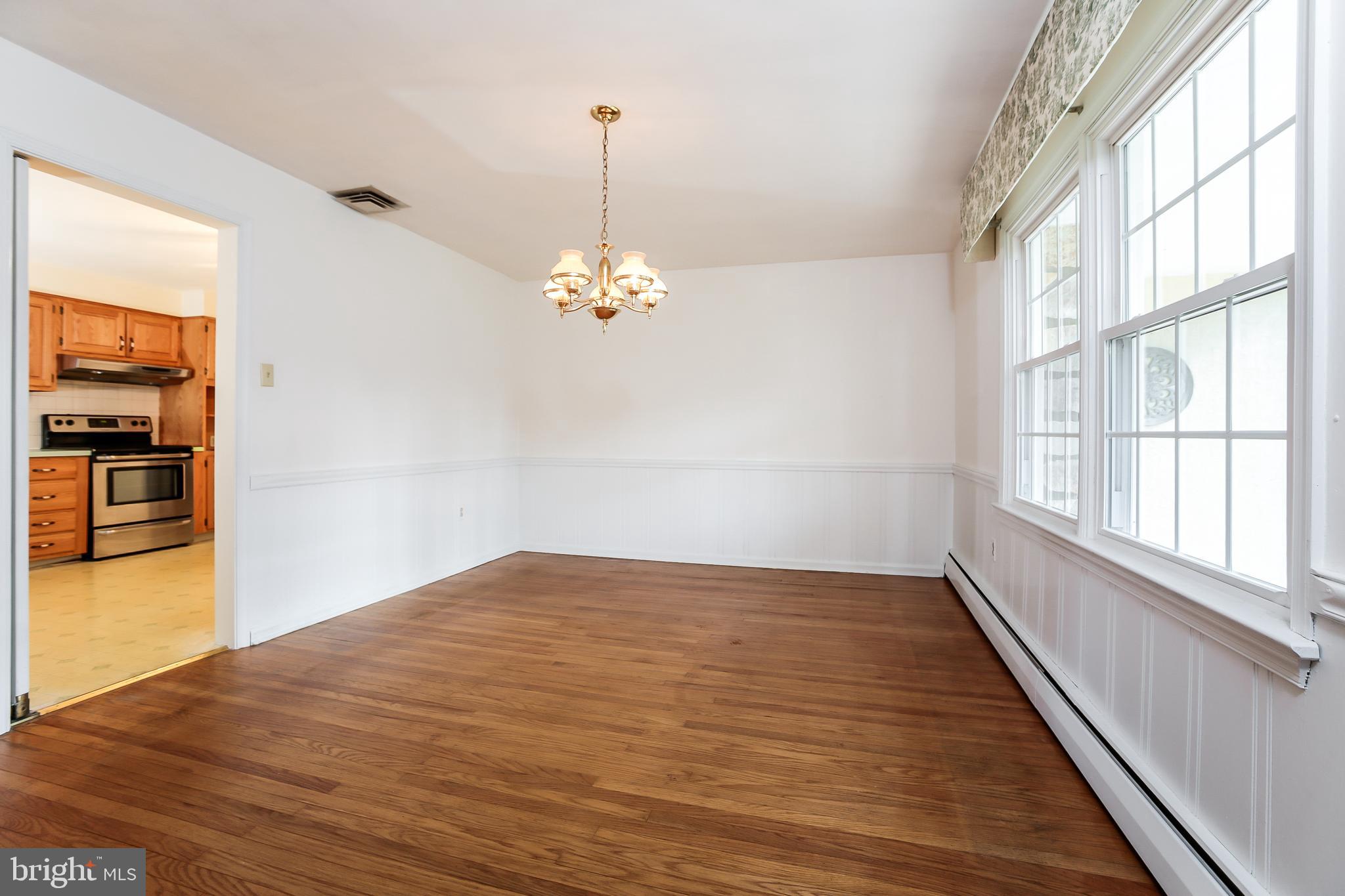 Formal Dining Room Leading To Kitchen